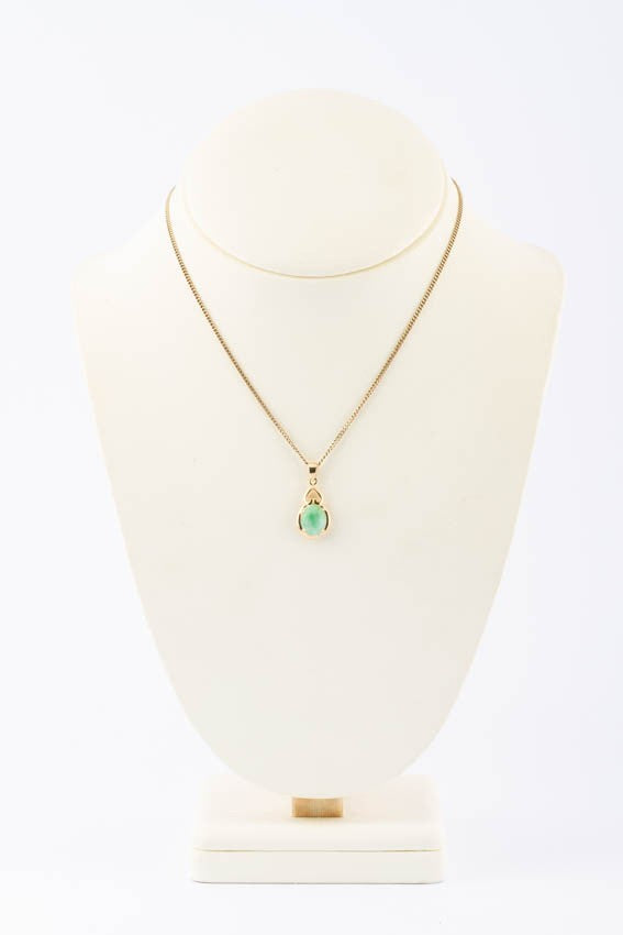 18 krt. gouden hanger met jade aan collier
