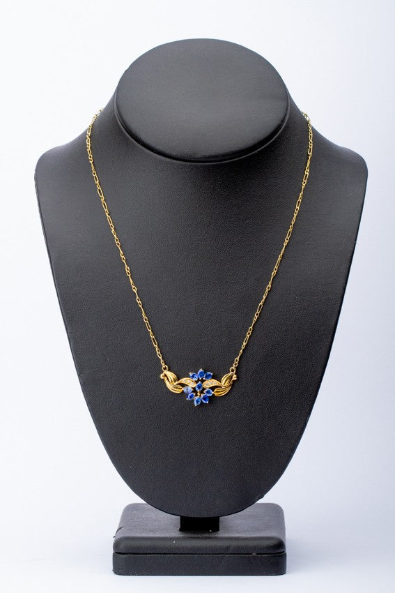 Gouden choker met tanzaniet en briljanten