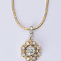 Gouden hanger met briljanten aan wit/geel gouden collier