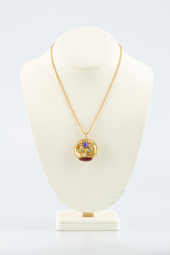 Massief gouden hanger met diverse edelstenen aan gouden collier