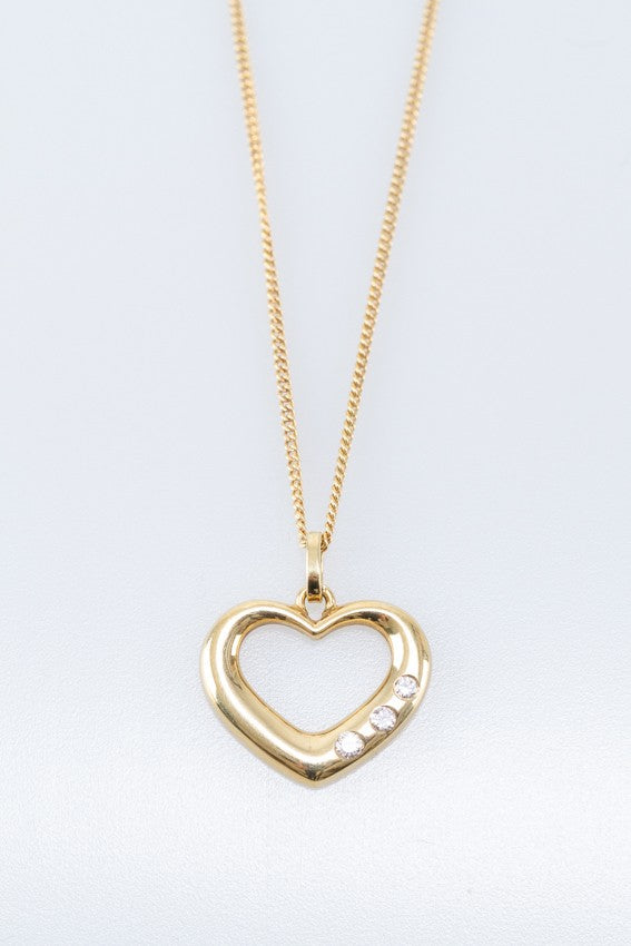 Gouden hart hanger met briljanten aan gouden collier