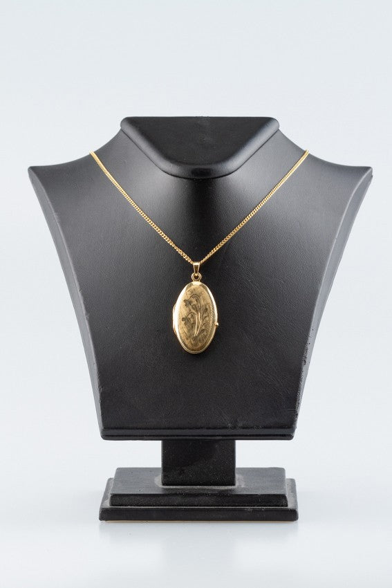 Gouden medaillon aan gouden gourmet collier