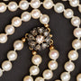 Cultive parel collier aan een gouden sluiting met diamanten