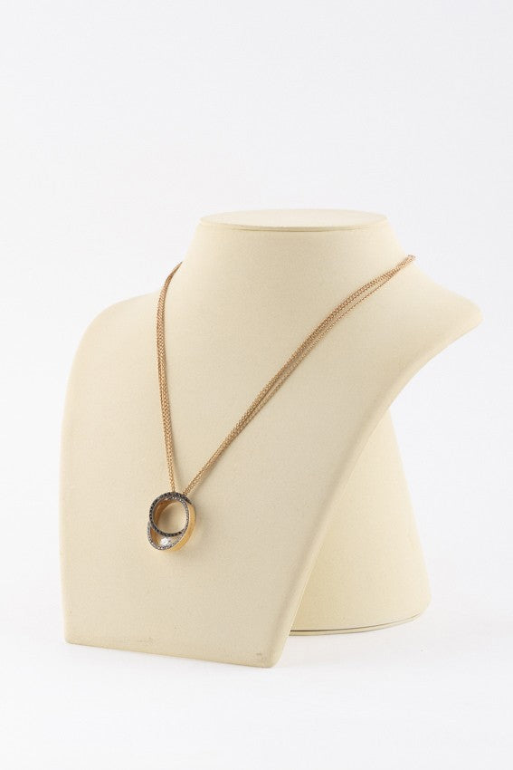 wit/rosé gouden hanger met een briljant van ca. 0.20ct.