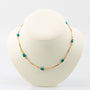 Gouden schakelcollier met turkoois