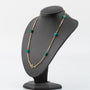Gouden schakelcollier met turkoois