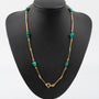 Gouden schakelcollier met turkoois