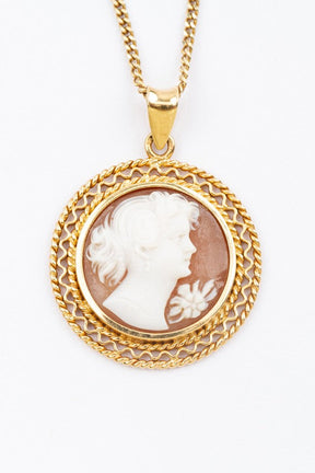 Shell cameo on gold necklace