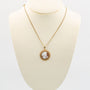 Shell cameo on gold necklace