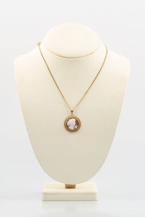 Shell cameo on gold necklace