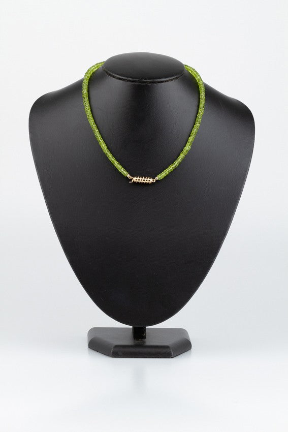 Peridot necklace with antique gold clasp