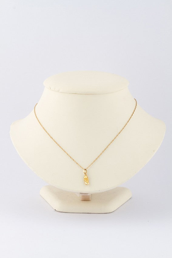 Gouden nugget hanger aan gouden collier