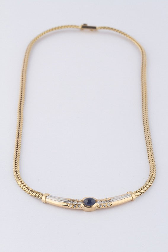 Wit/geel gouden collier van het merk Le Chic met saffier en briljant