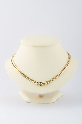 Geel gouden gourmet collier met bij het slot een cabochon geslepen saffier