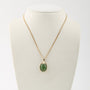 Gouden hanger met jade aan gouden collier
