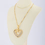 Gold heart pendant with 120 diamonds on a gold necklace