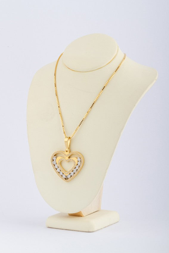 Gold heart pendant with 120 diamonds on a gold necklace