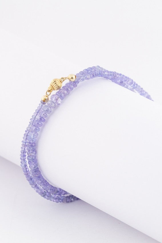 Tanzanite necklace en-chute strung on a gold clasp