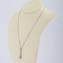 Antique white/yellow gold Art Deco pendant on a white gold necklace