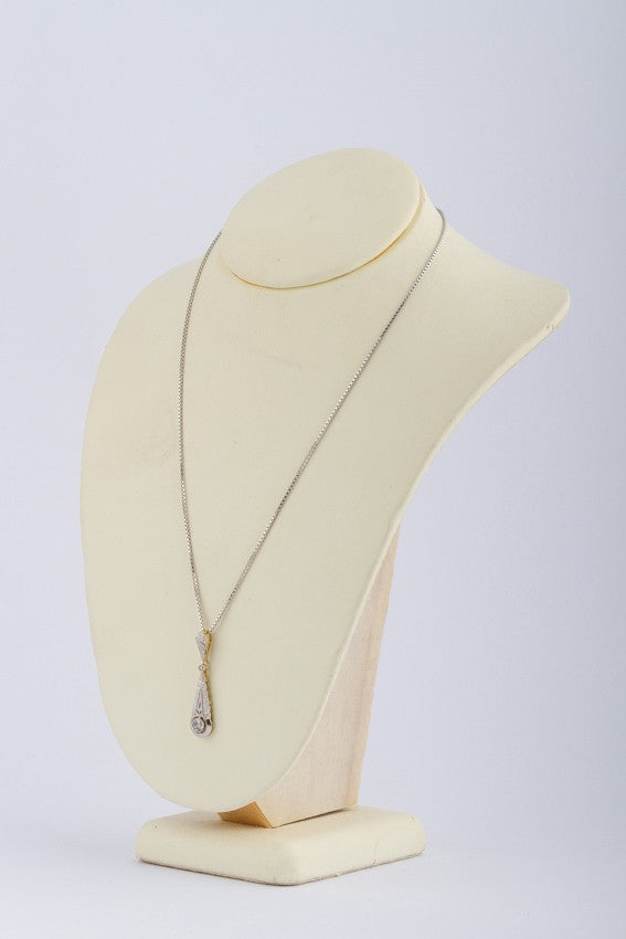 Antique white/yellow gold Art Deco pendant on a white gold necklace