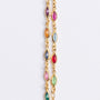 Gold link necklace with various glass colored stones