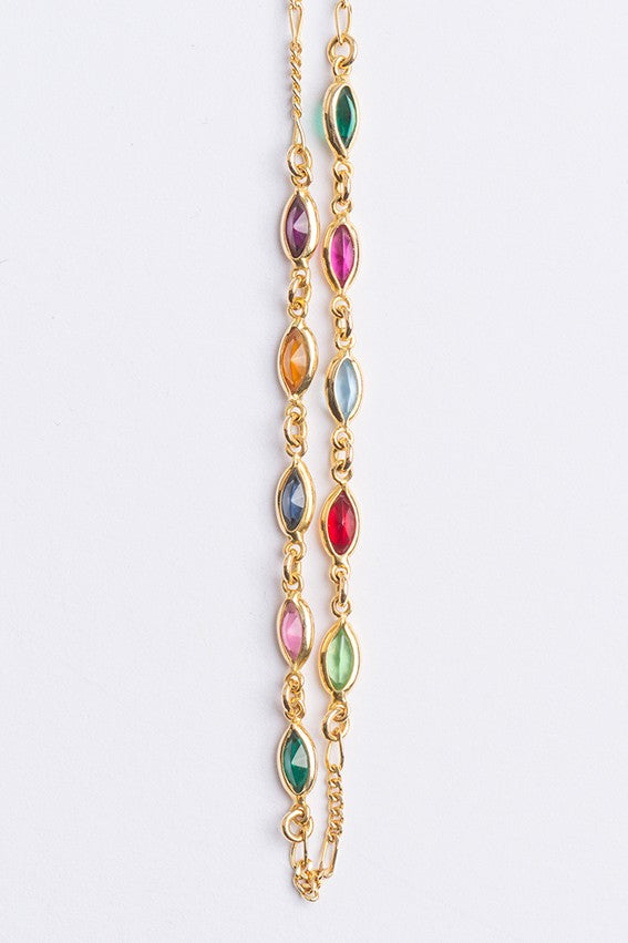 Gouden schakel collier met diverse glas kleur stenen