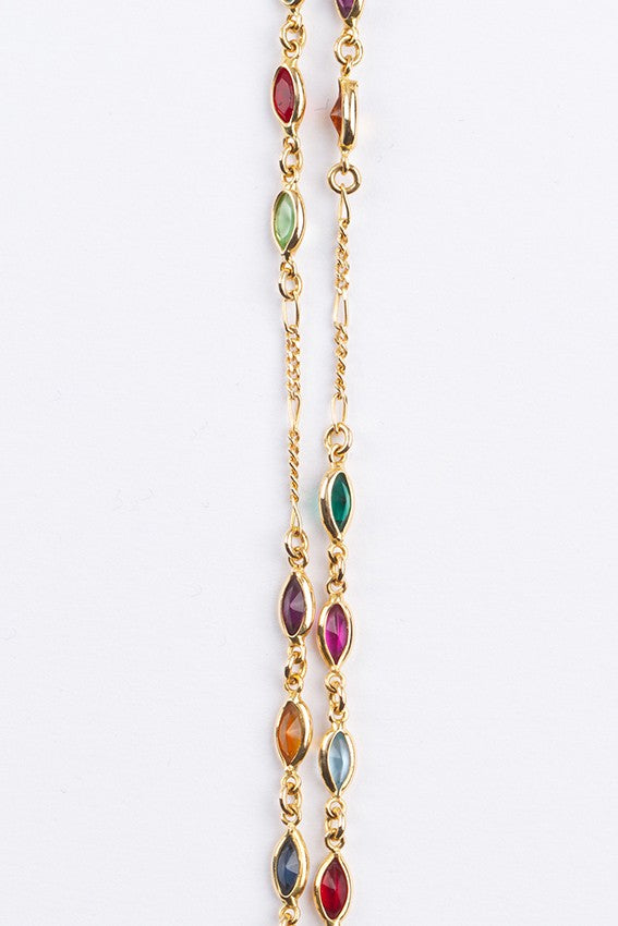 Gouden schakel collier met diverse glas kleur stenen