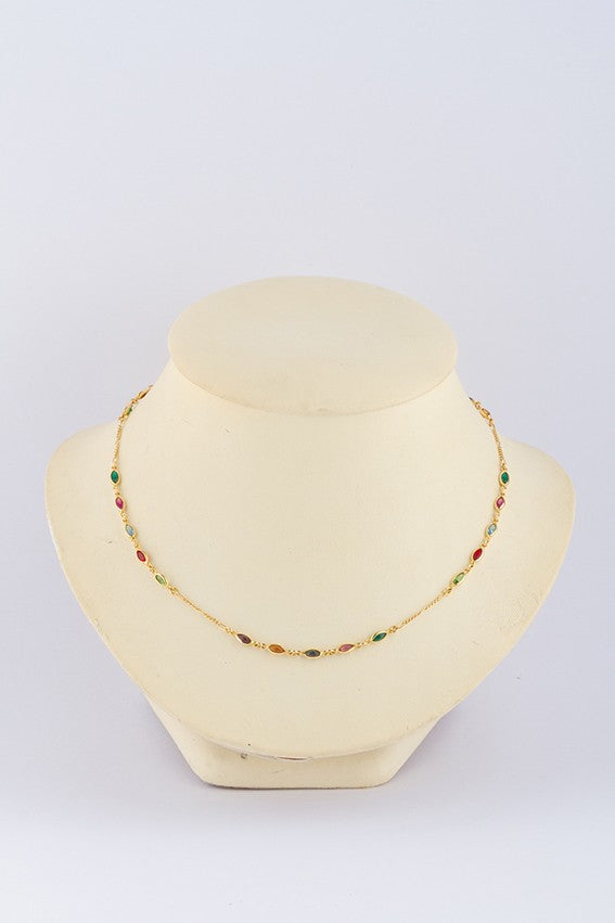 Gold link necklace with various glass colored stones