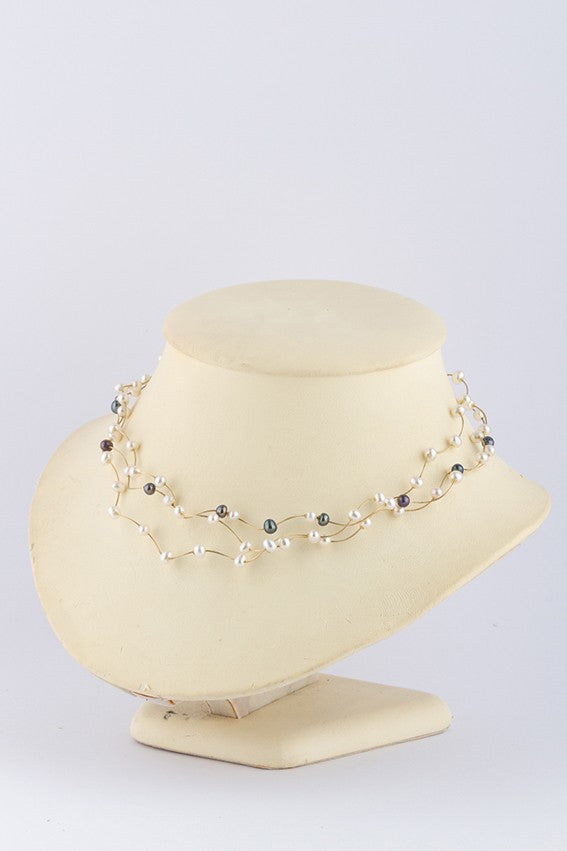 3-strengs collier met zoetwater parels aan gouden sluiting