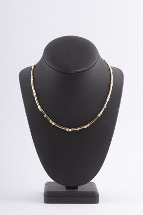 Gold link necklace with 3 diamonds