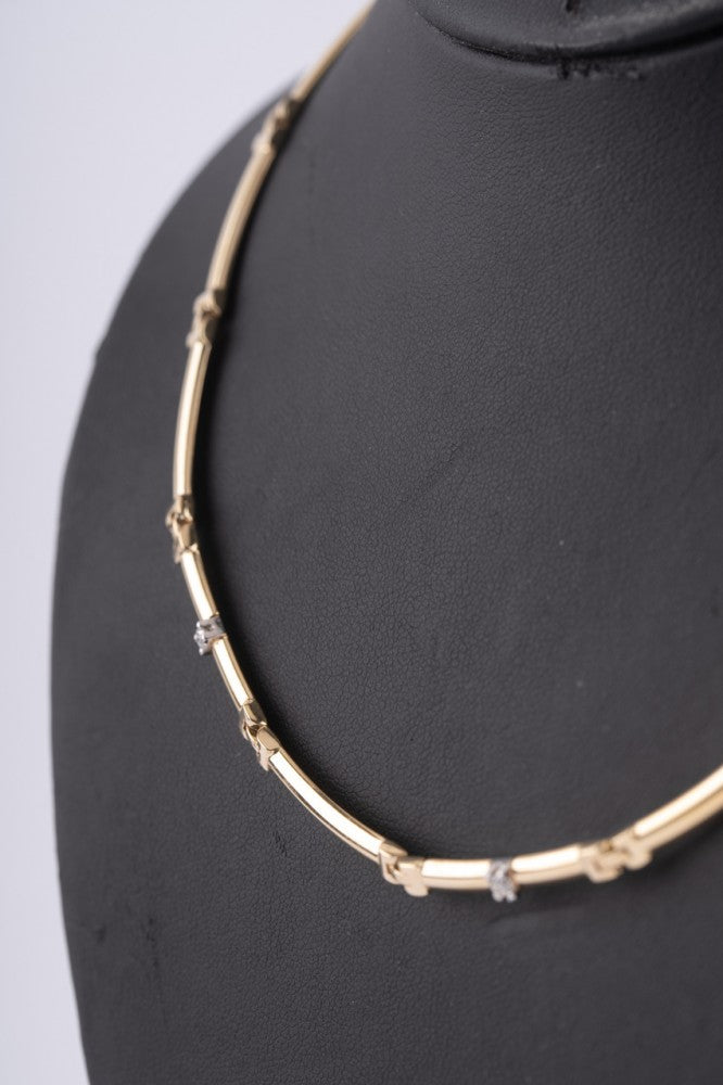 Gold link necklace with 3 diamonds