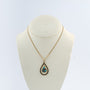 Gouden hanger met turkoois aan gouden collier