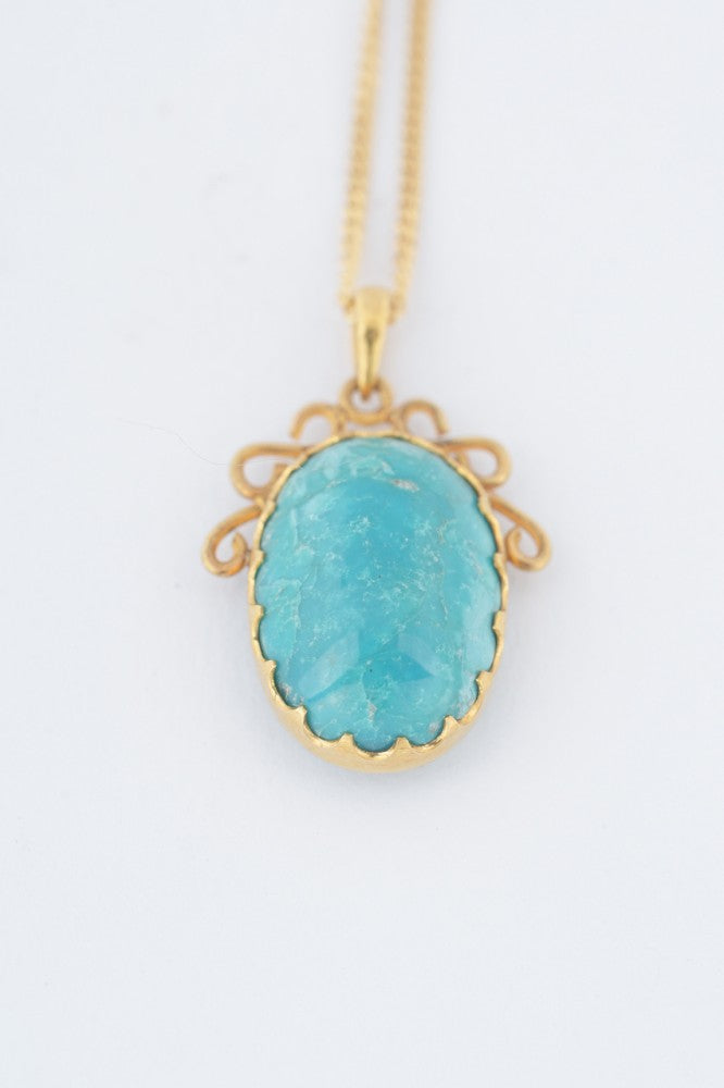 Gouden hanger met turkoois aan gouden gourmet collier