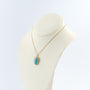 Gouden hanger met turkoois aan gouden gourmet collier