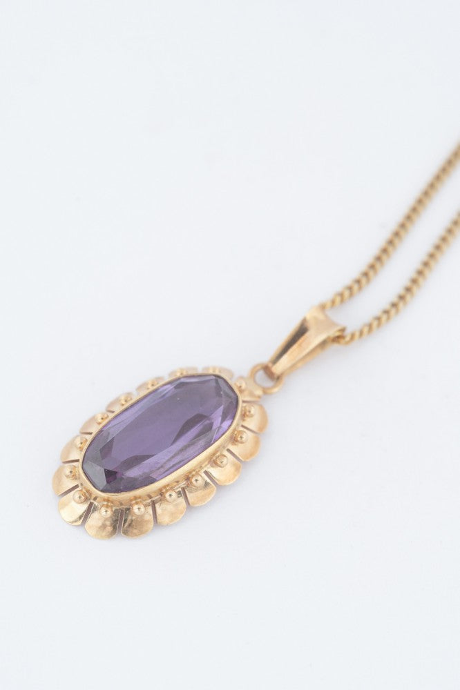 Gouden hanger met synth. korund aan gourmet collier