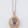 Gouden hanger met amethist aan gouden collier