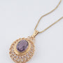 Gouden hanger met amethist aan gouden collier