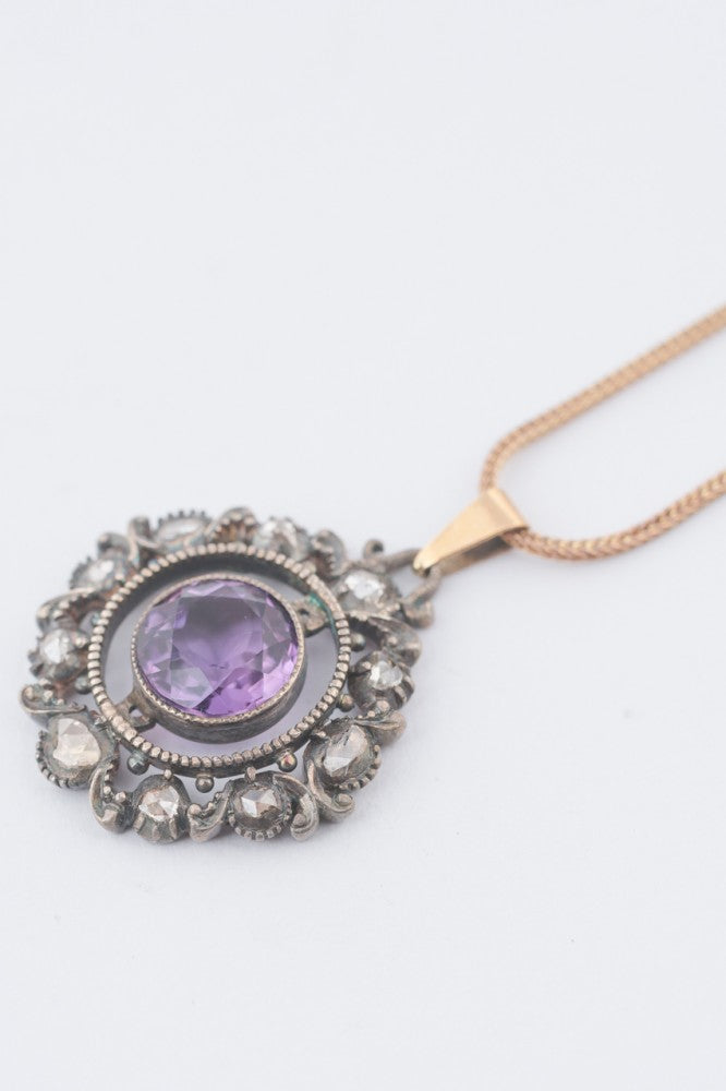 Gold/silver pendant with amethyst and diamonds on a gold foxtail necklace