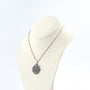 Gold/silver pendant with amethyst and diamonds on a gold foxtail necklace