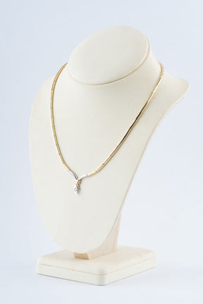 Wit/geel gouden collier met een briljant