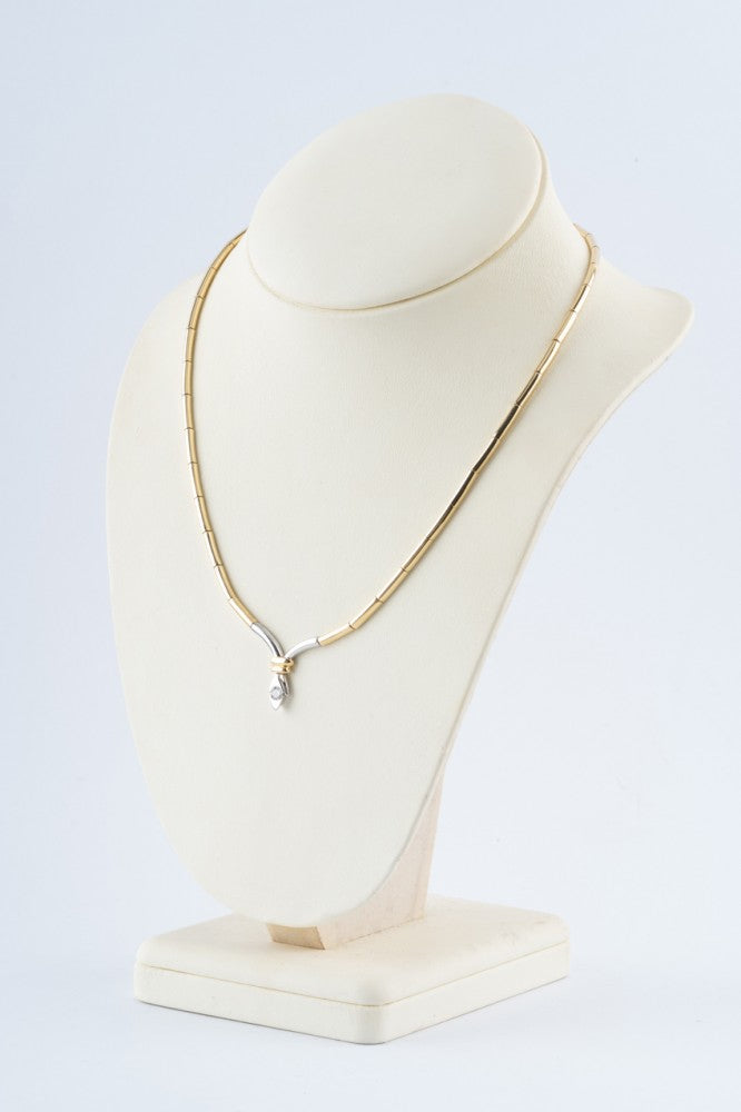 Wit/geel gouden collier met een briljant