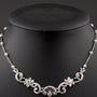 White gold choker with diamonds and pearls