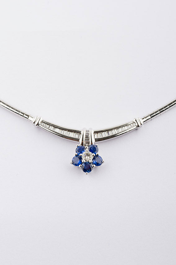 White gold necklace with brilliant and sapphire