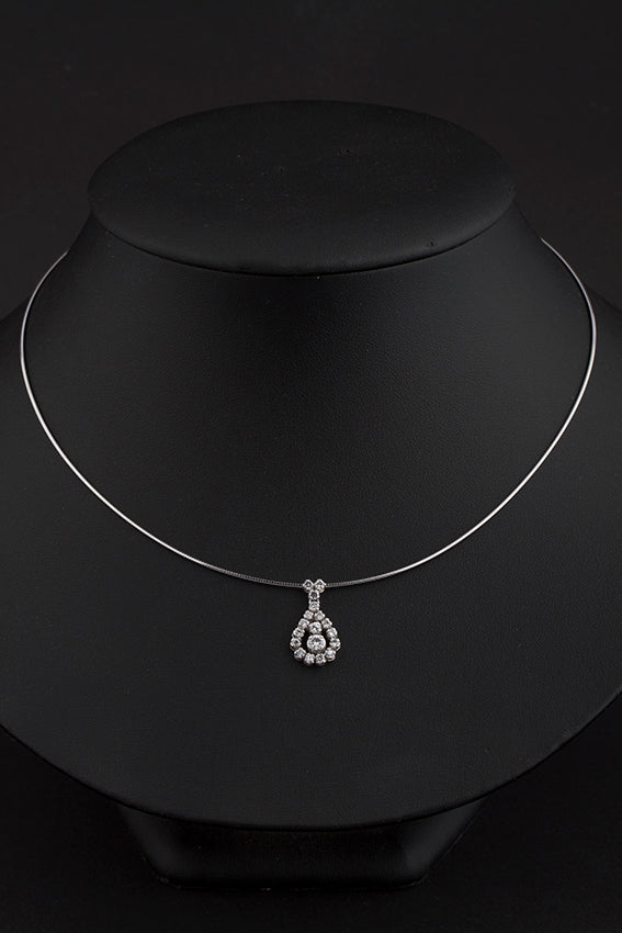 White gold pendant with brilliant cut diamond on omega necklace
