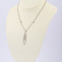 White gold pendant with diamonds on a white gold necklace