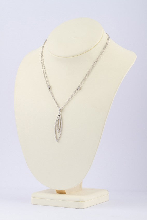 White gold pendant with diamonds on a white gold necklace