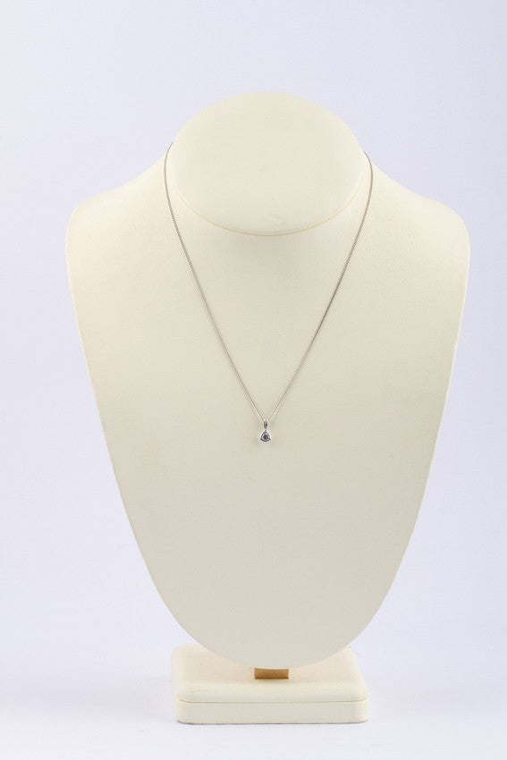 White gold solitaire pendant with a brilliant on a white gold necklace