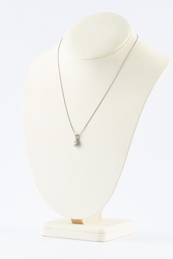 White gold pendant with 12 diamonds on a white gold necklace