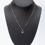 White gold pendant with a brilliant on a white gold necklace