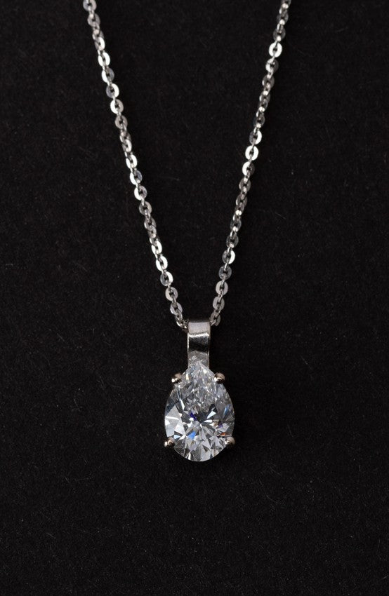 white gold pendant with a pear-shaped cut diamond on a white gold necklace